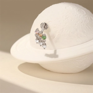 Detailed macro view of S925 sterling silver earring post featuring colorful zircon stones