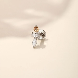 Detail of s925 silver cartilage stud with marquise and round champagne zircon stones