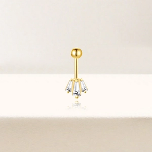 Art deco gouden piercing sieraad met waaiervormige baguette zirkonia stenen