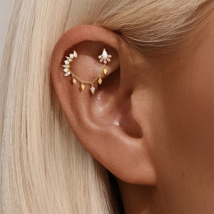 Detailed close-up of S925 silver gold-plated chain earrings with opal and zircon accents