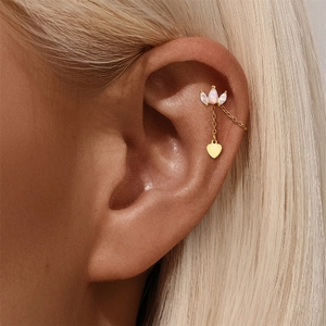 Detail of S925 silver gold earring featuring opal heart pendant and long dangling chain