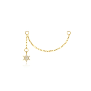 Close-up of gold chain earring with a sparkling pavé star pendant on white background