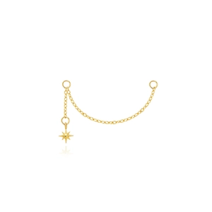Macro detail of gold chain connector with polished North Star starburst pendant