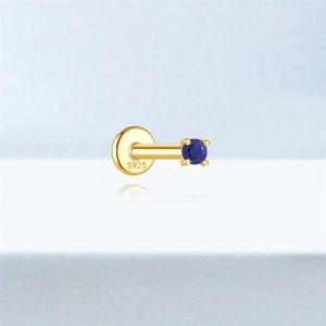 Close-up of S925 sterling silver ear stud featuring a round blue lapis lazuli stone