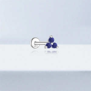 Close-up of S925 sterling silver labret stud with three round blue lapis lazuli stones