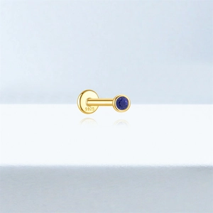 Detailed view of S925 gold lapis lazuli labret stud with polished metal finish