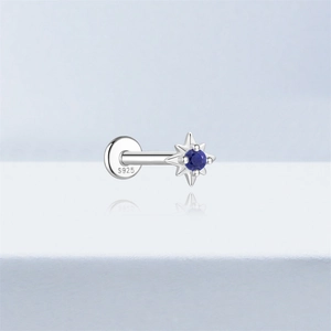 Close-up of S925 sterling silver ear stud featuring a hexagram star and blue lapis lazuli
