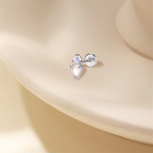 Macro shot of S925 sterling silver flat back stud with moonstone and S925 hallmark