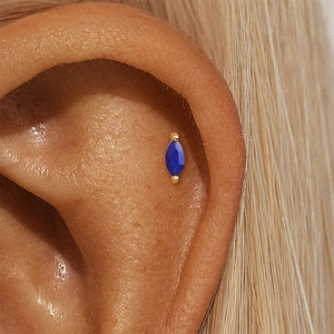 Close-up of S925 silver lapis lazuli stud earring featuring marquise cut blue stone