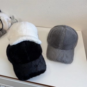 Faux fur plush baseball cap for winter available in black, white, and grey colors