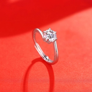 Detailed view of 1 carat moissanite ring with six-prong setting and adjustable silver band