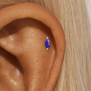Macro view of marquise-cut lapis lazuli stud earring in s925 silver setting