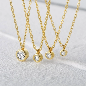 Detailed comparison of four S925 sterling silver gold-plated solitaire diamond necklaces