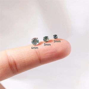 Detailed size comparison of 2mm, 3mm, and 4mm round moss agate earrings on fingertips