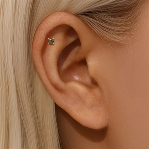 Detail of s925 moss agate stud earring with round green stone in four-prong gold setting