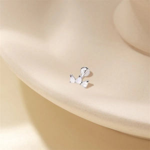 Macro shot of S925 sterling silver hallmark on the bezel setting of moonstone stud