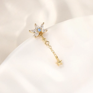 Detail of s925 silver sunflower stud earring with blue opal and golden fringe star
