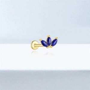 Macro detail of S925 sterling silver ear stud with marquise-cut blue lapis lazuli stones