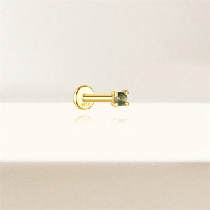 Macro shot of 18k gold-plated S925 silver stud with round green moss agate gemstone