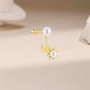 Detailed macro of S925 silver sunflower earring with blue opal and white pearls