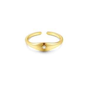 Detail of adjustable gold ring featuring a star-shaped setting with a clear zircon stone