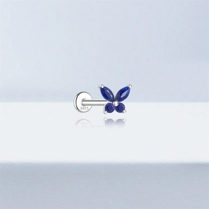 Close-up of S925 sterling silver butterfly stud earring with blue stones and S925 hallmark