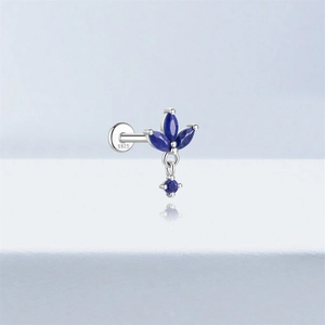 Detail view of S925 sterling silver earring featuring blue marquise cut leaf stones