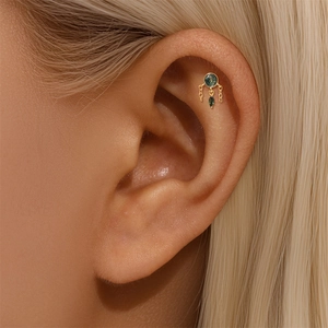 Detail of s925 gold moss agate ear stud featuring a round gem and teardrop dangle charms
