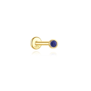 Detailed macro view of S925 silver gold-plated stud with blue lapis lazuli stone