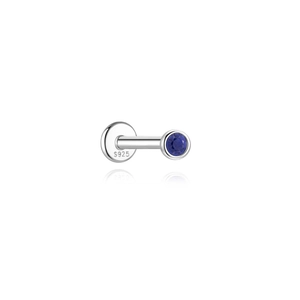 Macro shot of S925 sterling silver stamp and blue lapis lazuli on flat back stud earring