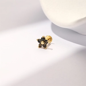 Detail of flower stud earring with black crystals and S925 silver hallmark engraving