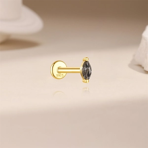 Detail of s925 silver labret stud with marquise black rutilated quartz and crown design