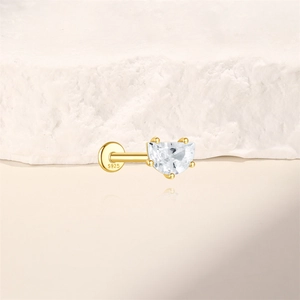 Detail of S925 sterling silver stamp on golden labret stud with white zircon stone