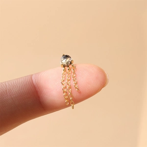 Macro shot of s925 silver fringe stud earring with black rutilated quartz gemstone