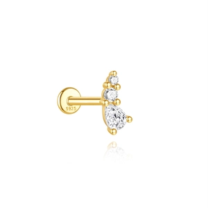 Macro shot of S925 sterling silver ear stud with gold plating and cubic zirconia stones
