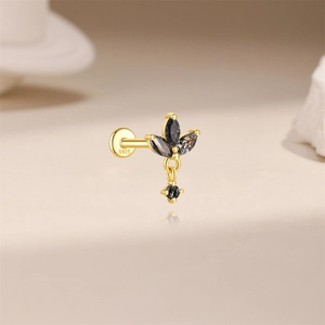 Detailed macro view of S925 silver earring featuring black gemstone flower design