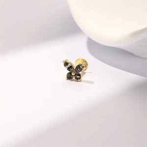 Detailed view of golden butterfly earring with black rutilated quartz and S925 hallmark