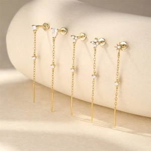 Detailed view of S925 sterling silver flower and heart tassel earrings with gold plating