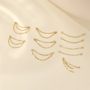 Detailed view of various S925 sterling silver gold-plated chains and DIY jewelry connectors