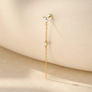 Macro detail of S925 sterling silver stamp on gold flower tassel drop earring