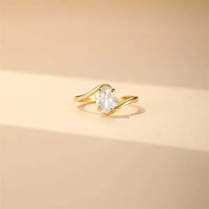 Macro shot of 18K gold plated S925 silver ring featuring an oval cut zircon stone