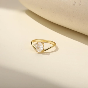 Detailed close-up of S925 silver stamp and oval clear gemstone in four-prong setting