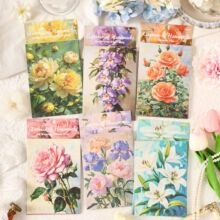 Detailed view of vintage PET floral stickers with lace and pearl aesthetic decor