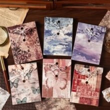 Detailed view of vintage themed adhesive stickers featuring retro butterfly and sky designs