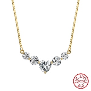 Polished 925 sterling silver necklace with heart-shaped moissanite pendant on white background