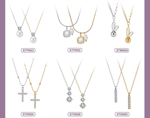 Collection of geometric necklaces in gold and silver finish with pearl and shell details
