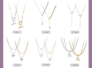 Collection of minimalist stainless steel necklaces with turquoise and geometric pendants