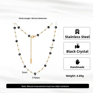 Minimalistisches Armband aus Gold-Edelstahl mit facettierten schwarzen Naturkristallen