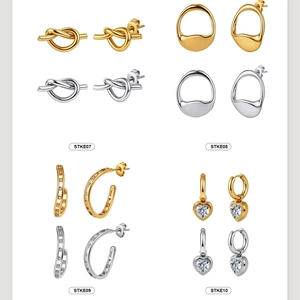Gold and silver stainless steel earring sets featuring knot, geometric, and heart designs