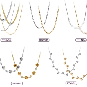 Collection of minimalist gold and silver stainless steel necklaces in various chic designs